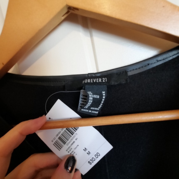 Extreme low front cut faux leather dress - Picture 2 of 4